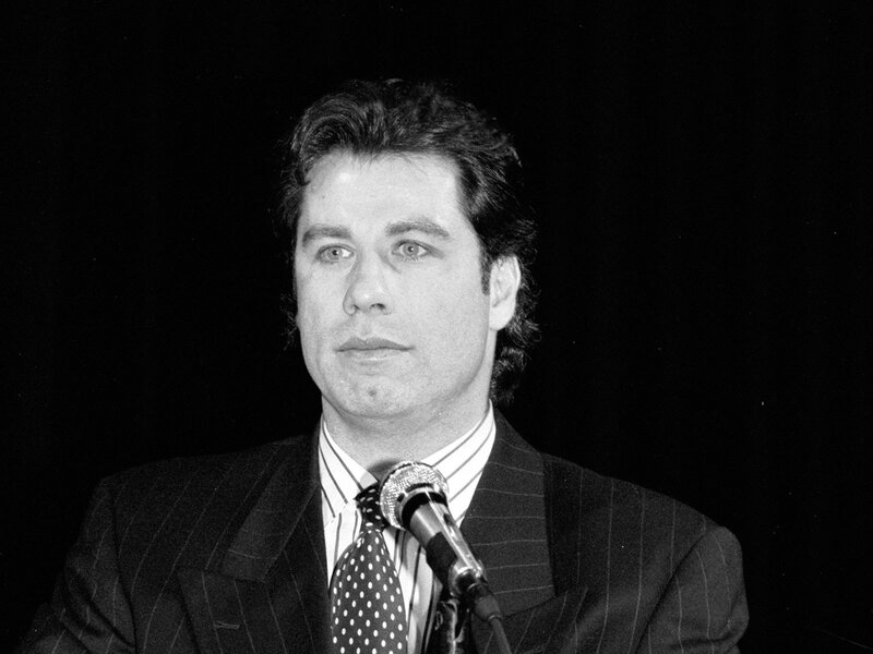 Man in Suit Speaking — Black