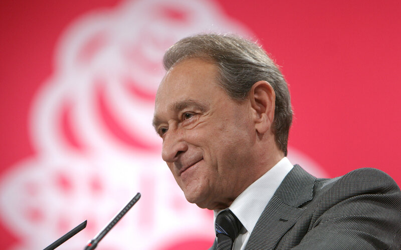 Man in Suit Speaking — Red