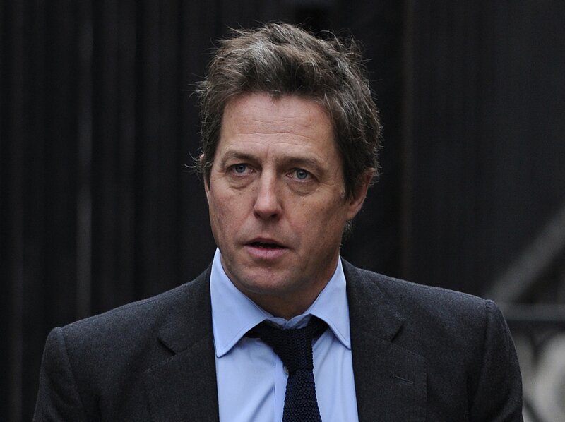 man in suit speaking