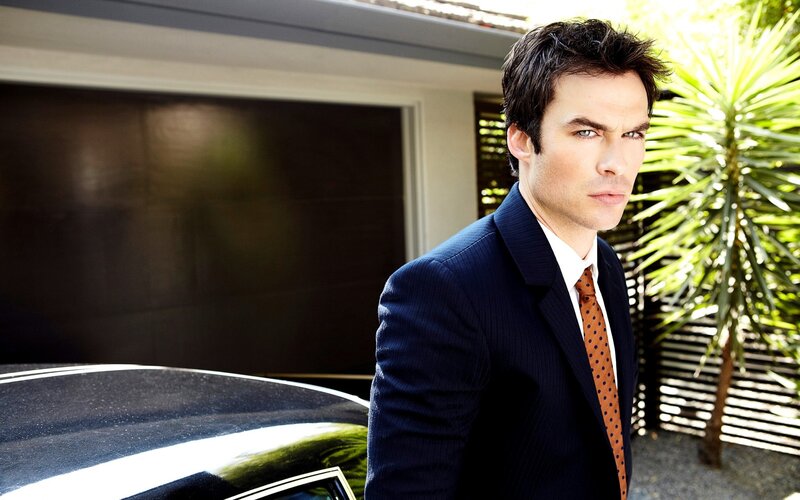 Man in Suit Standing — Blue, Serious, Afternoon