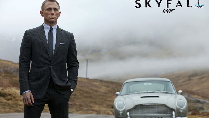 Man in Suit Standing — Gray, Dramatic, Photograph, Car, Mountain