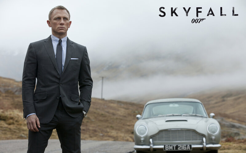 Man in Suit Standing — Gray, Dramatic, Photograph, Car