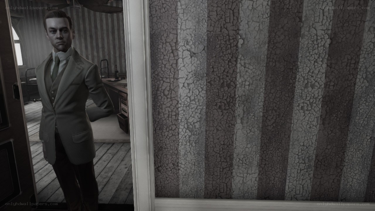 man in suit standing in room