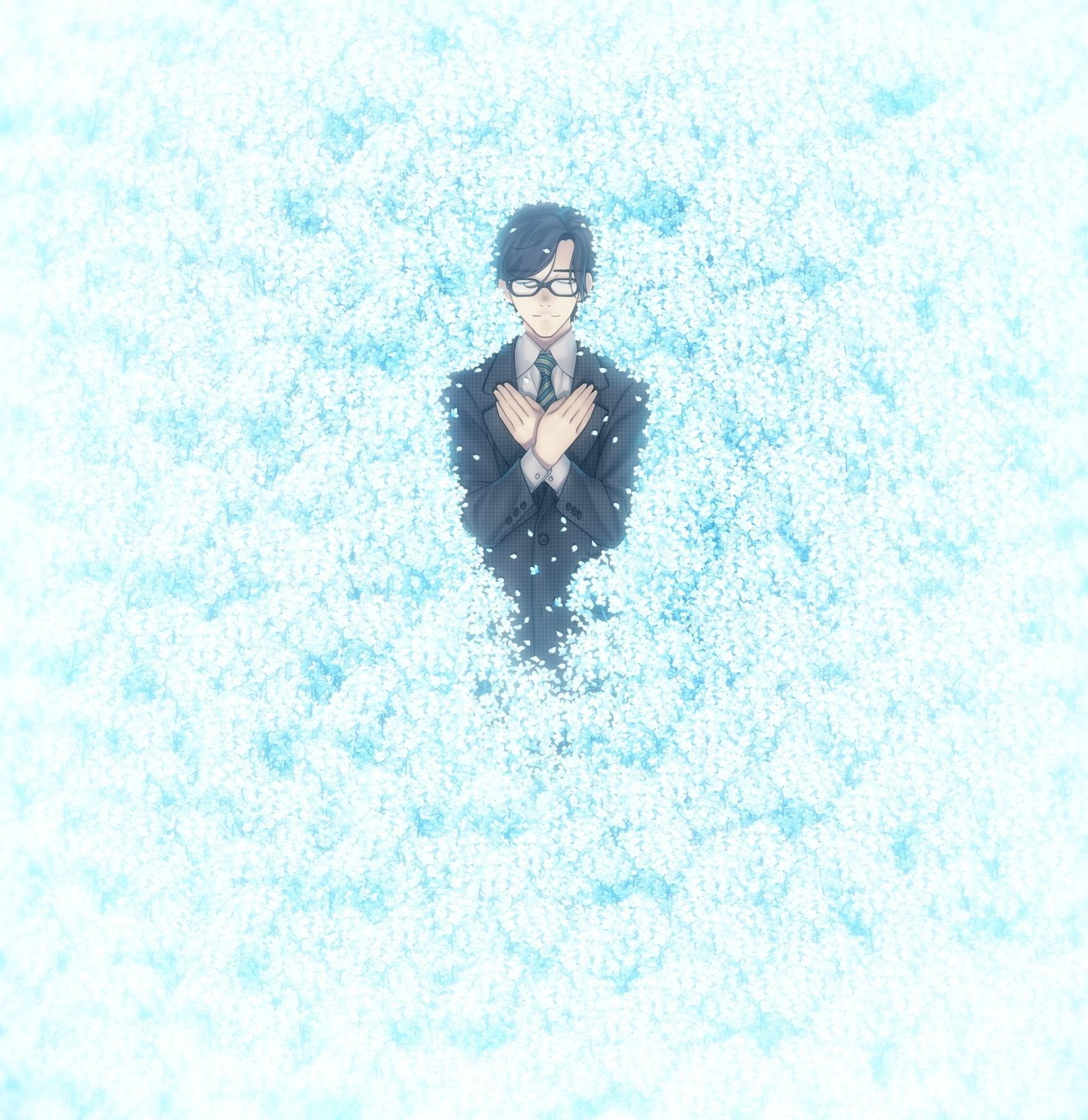 man in suit surrounded by flowers