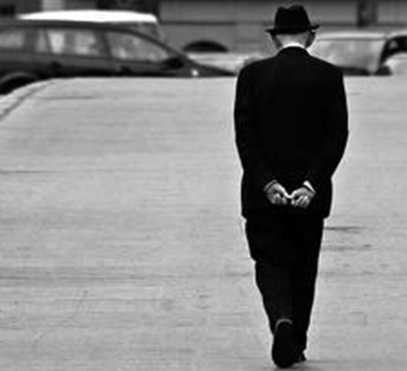 Man in Suit Walking — Black, Solemn