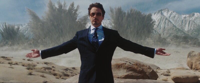 Man in Suit with Arms Outstretched — Blue, Dramatic