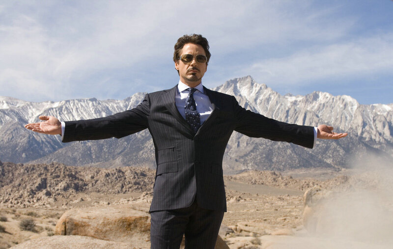 Man in Suit with Arms Outstretched — Blue
