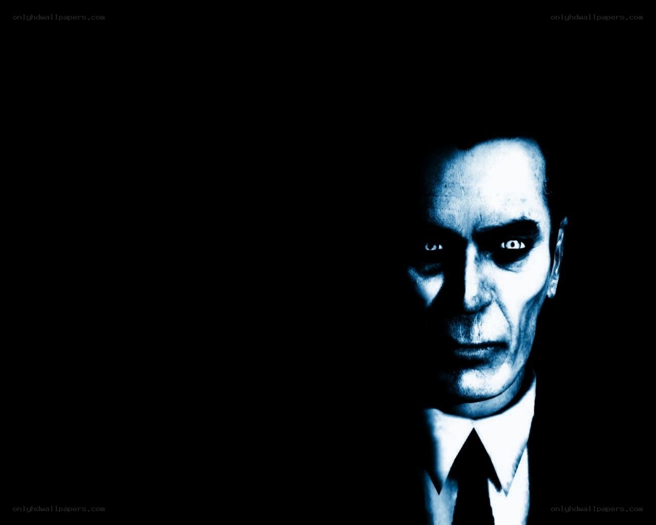 man in suit with blue lighting