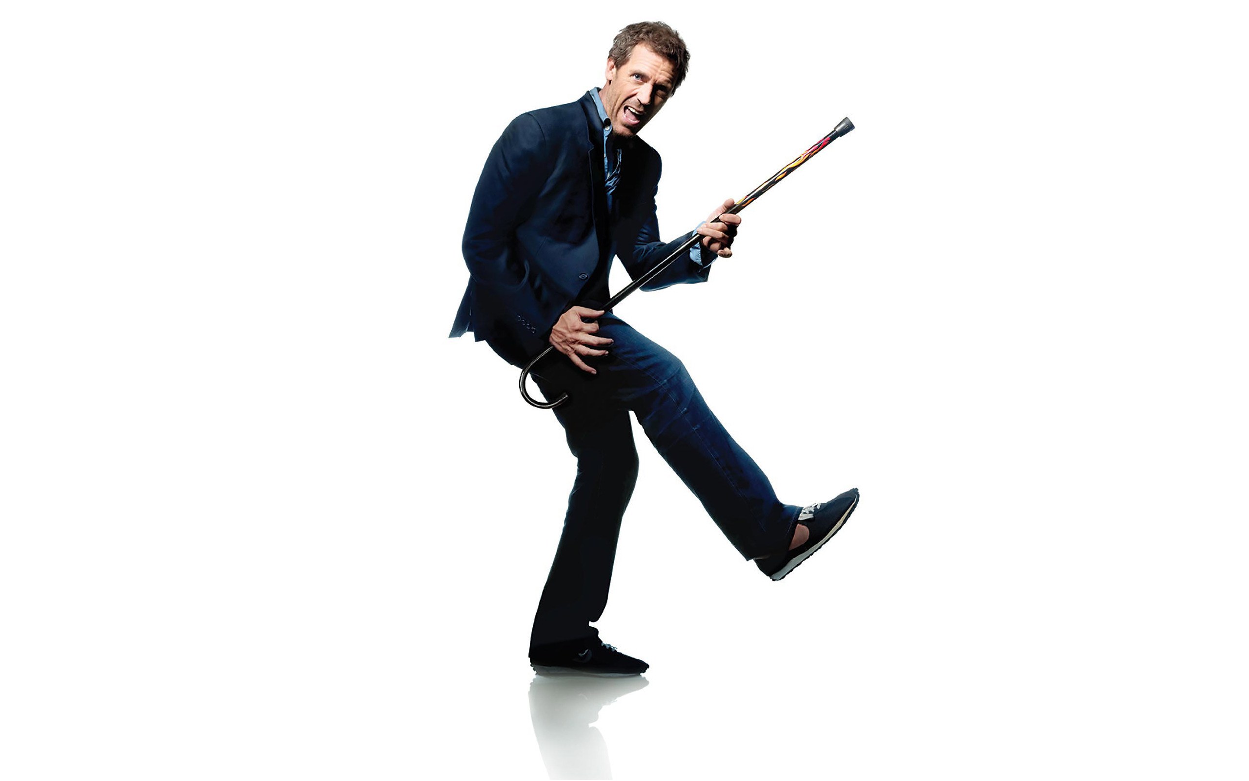 man in suit with cane