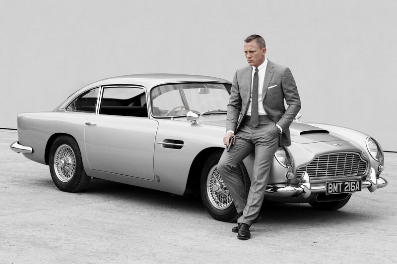 Man in Suit with Car — Gray, Serious