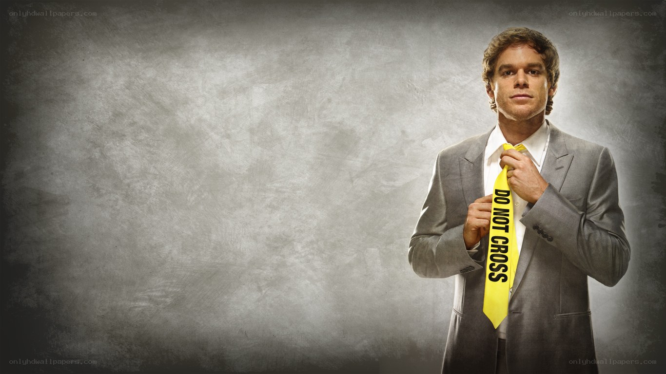 man in suit with caution tape