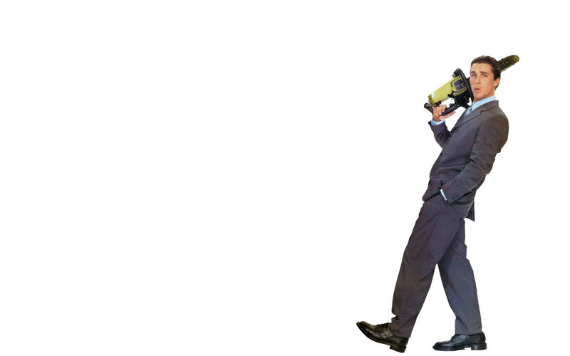 Man in Suit with Chainsaw