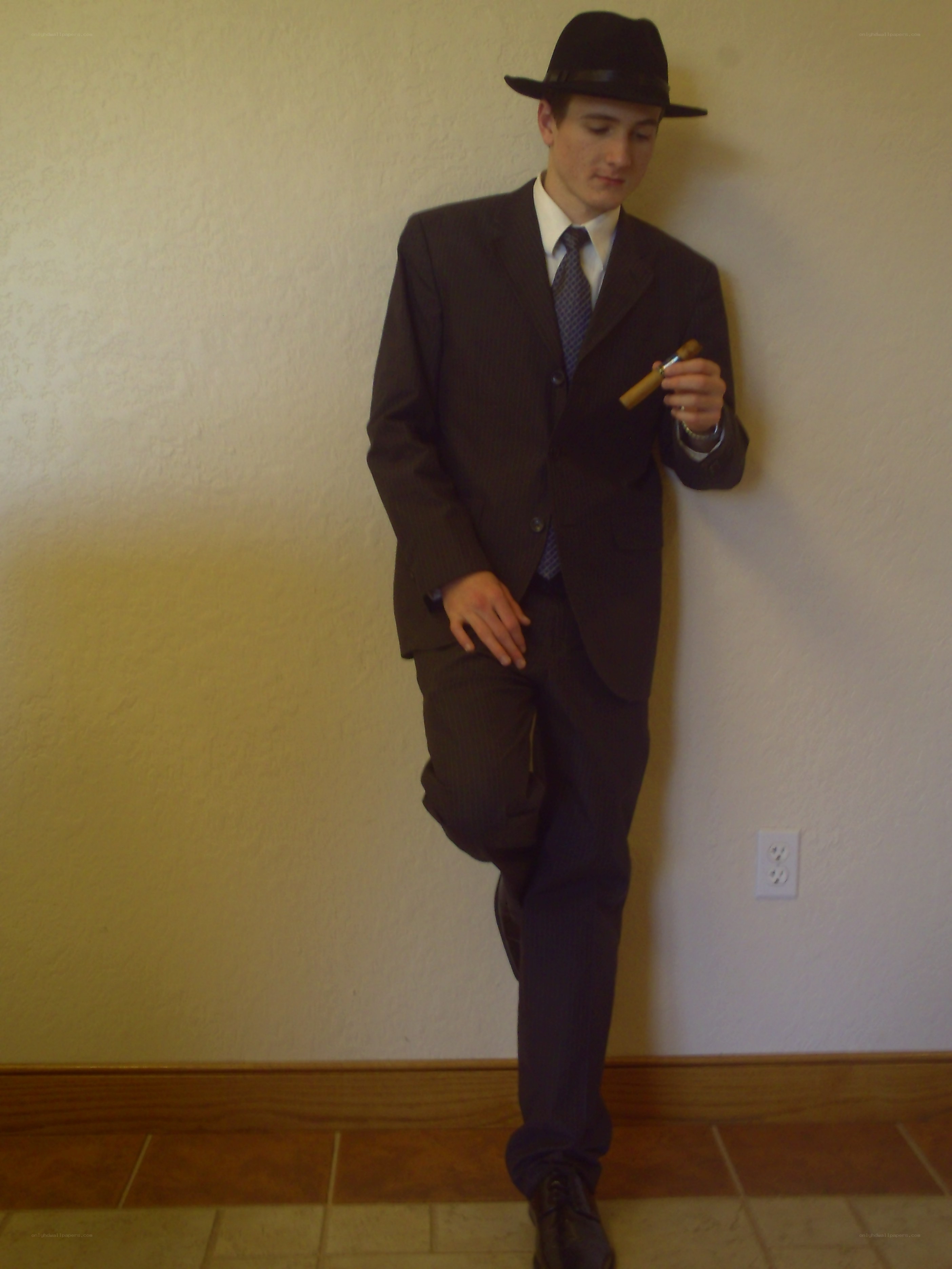 man in suit with cigar