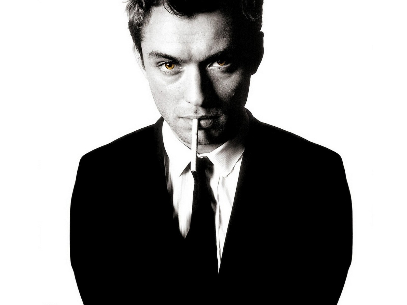 man in suit with cigarette