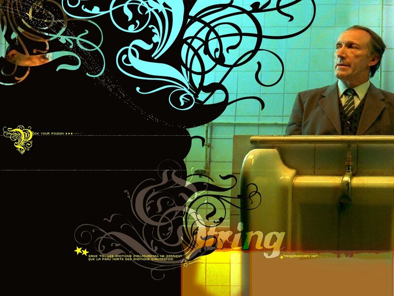 Man in suit with decorative swirls