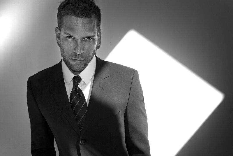 man in suit with dramatic lighting