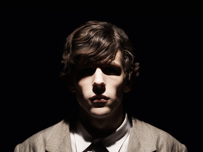 man in suit with dramatic lighting