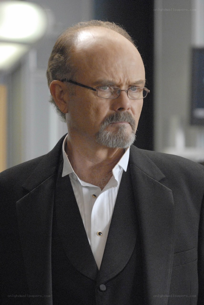 man in suit with glasses