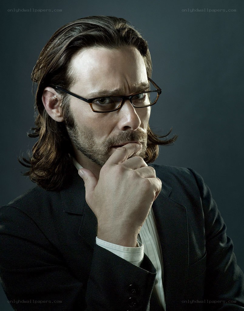 man in suit with glasses