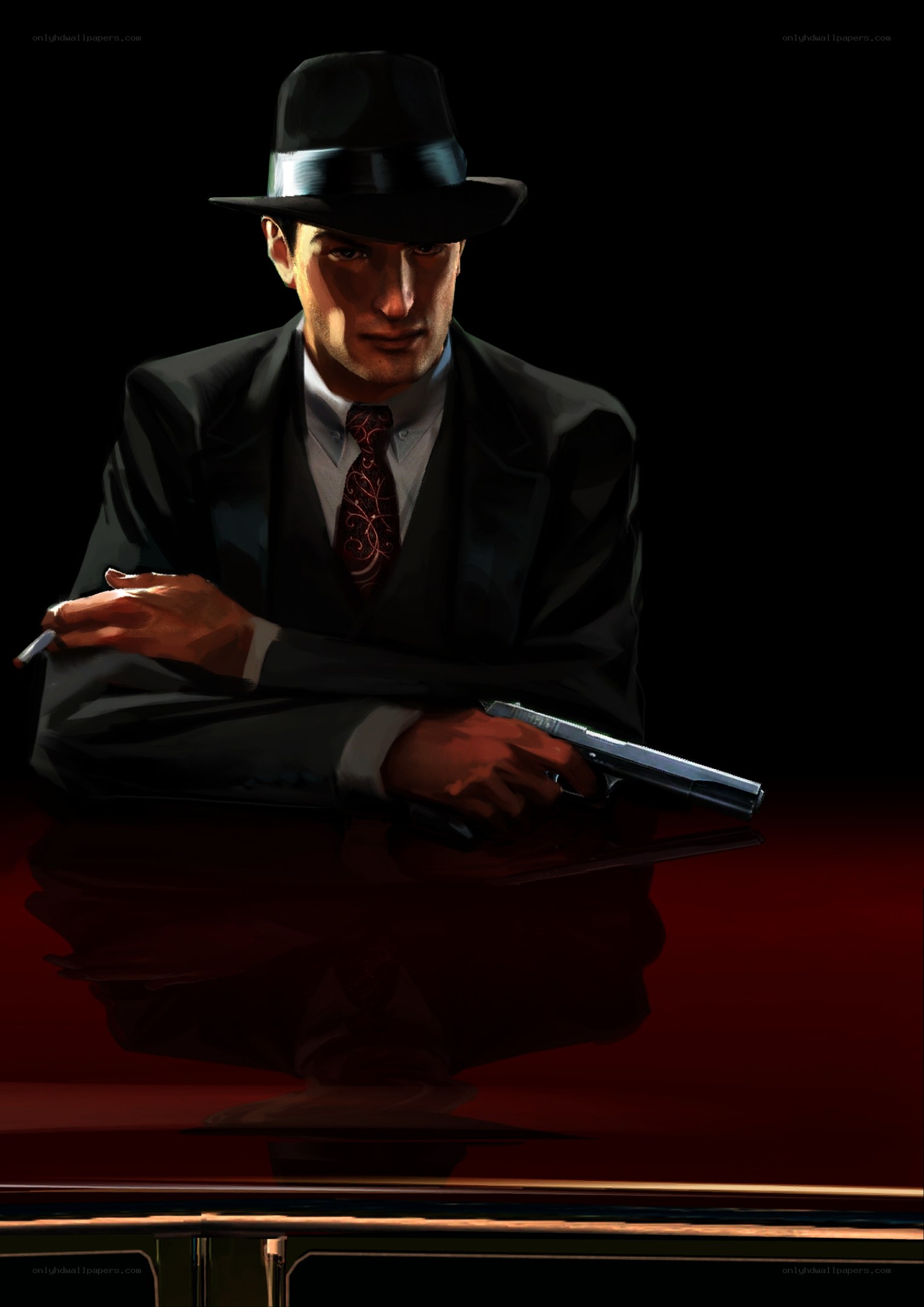 man in suit with gun