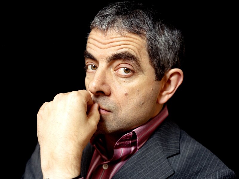 Man in Suit with Hand to Face — Black