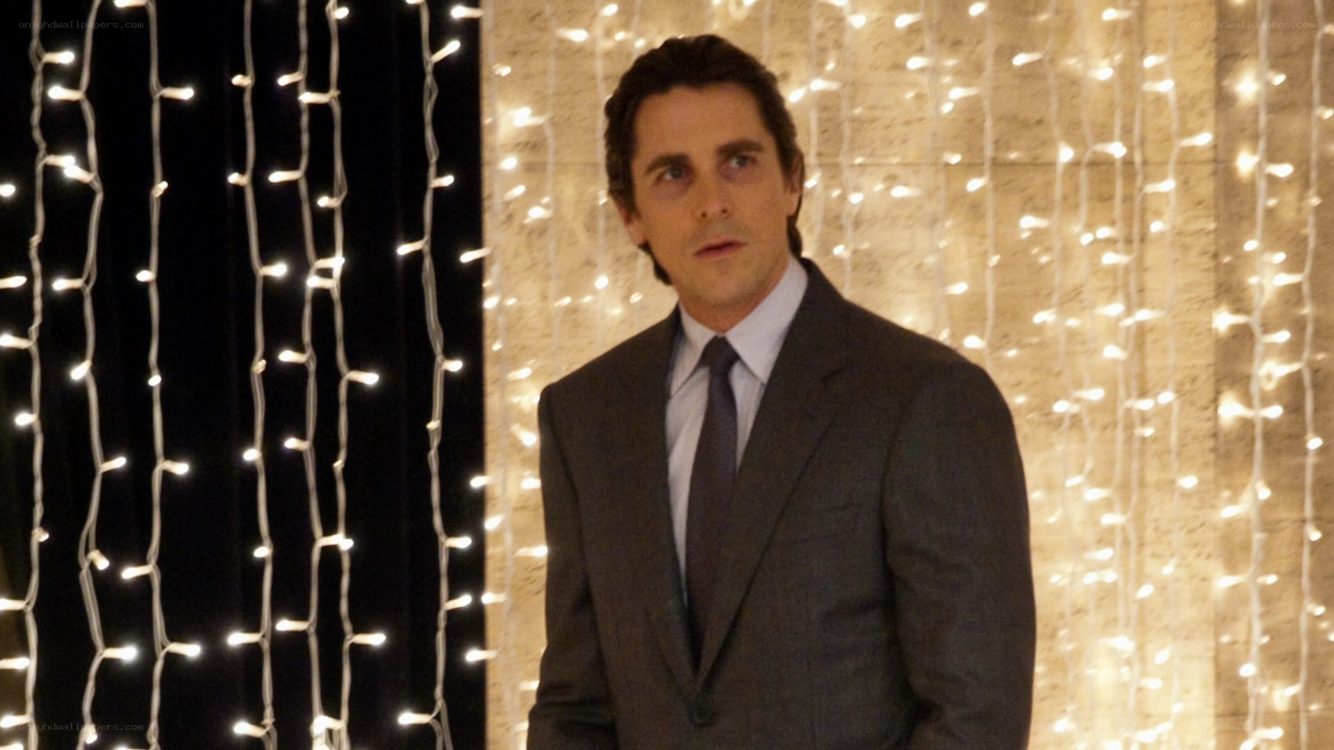 man in suit with lights