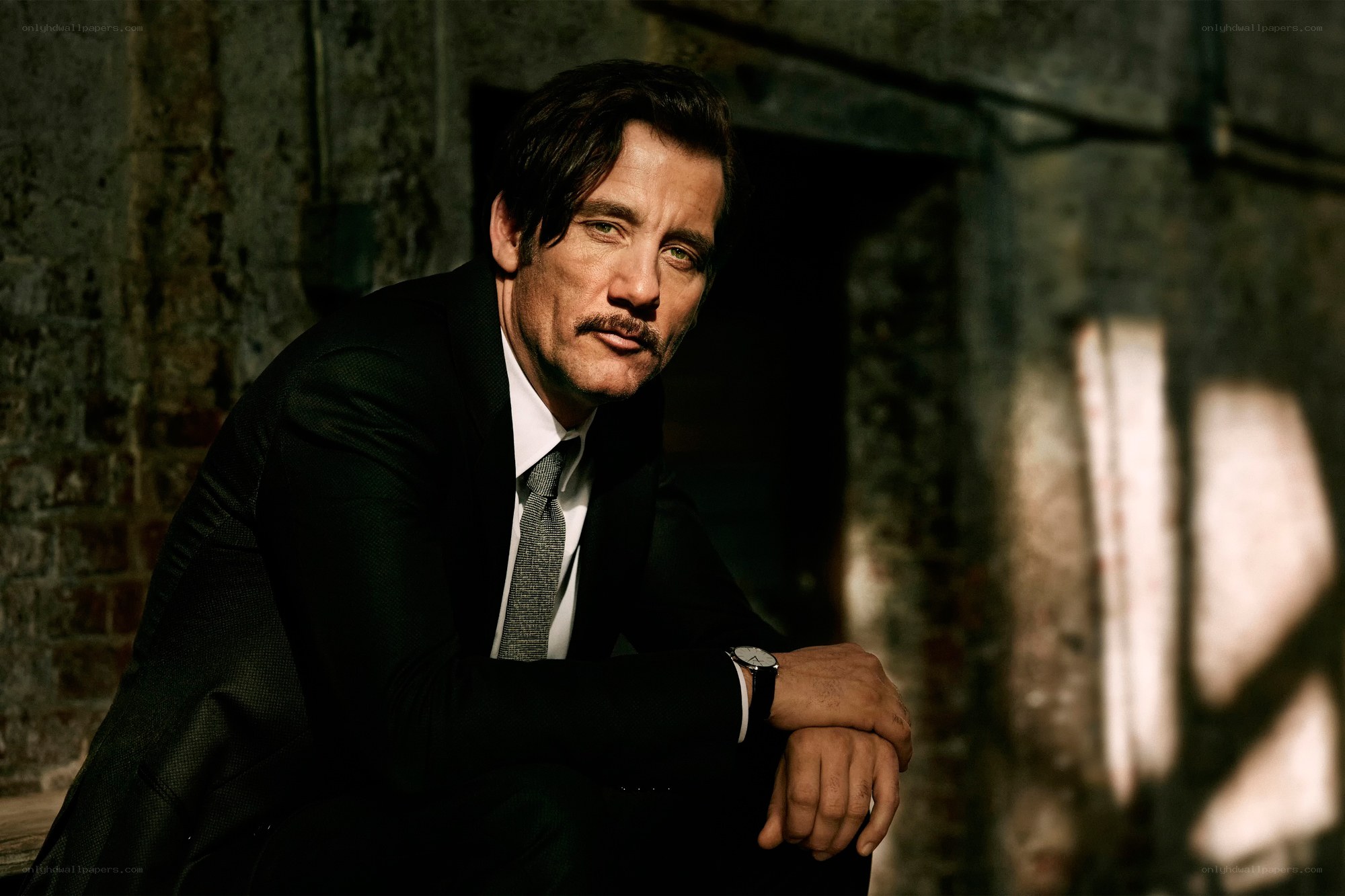 man in suit with mustache