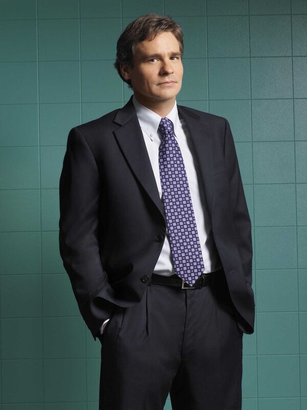 man in suit with patterned tie