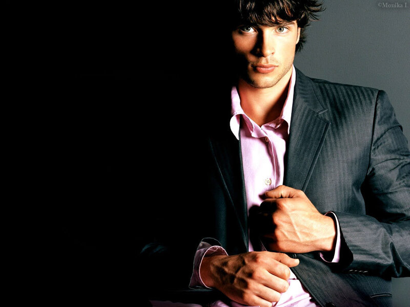 man in suit with pink shirt