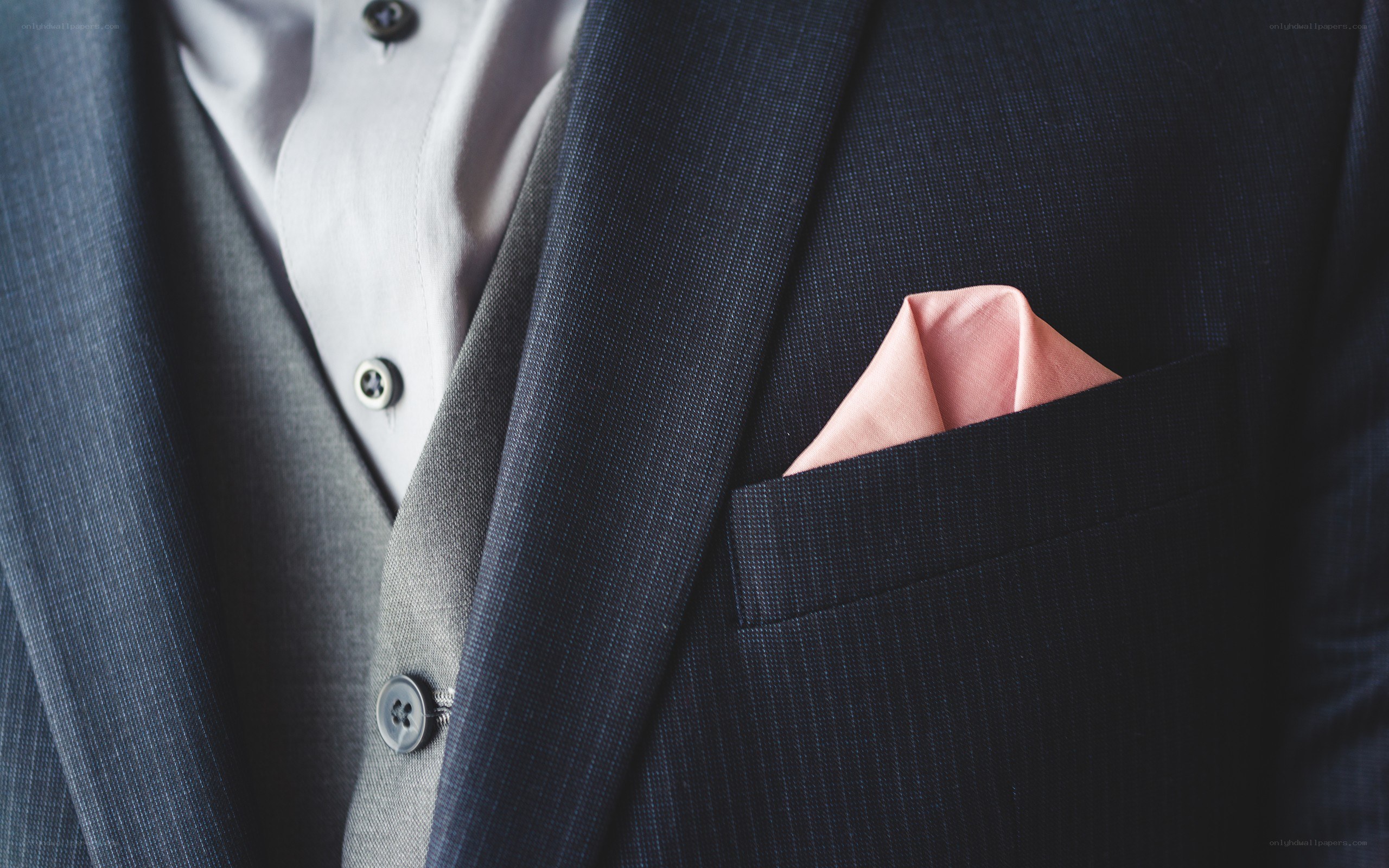 man in suit with pocket square
