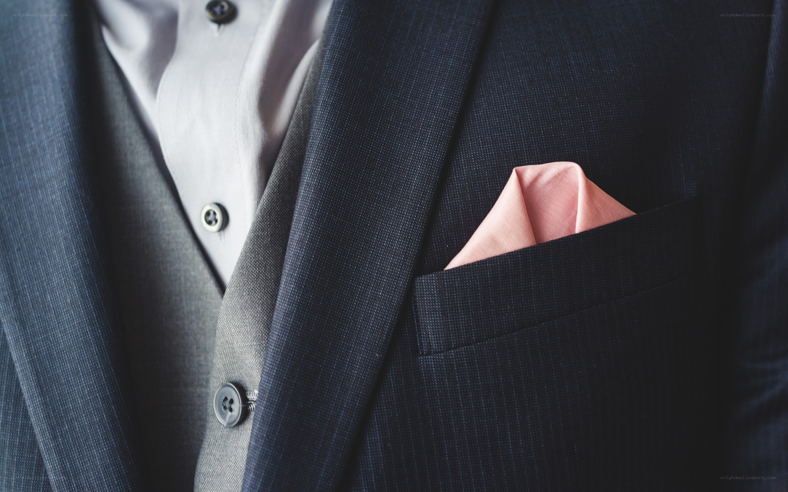 man in suit with pocket square