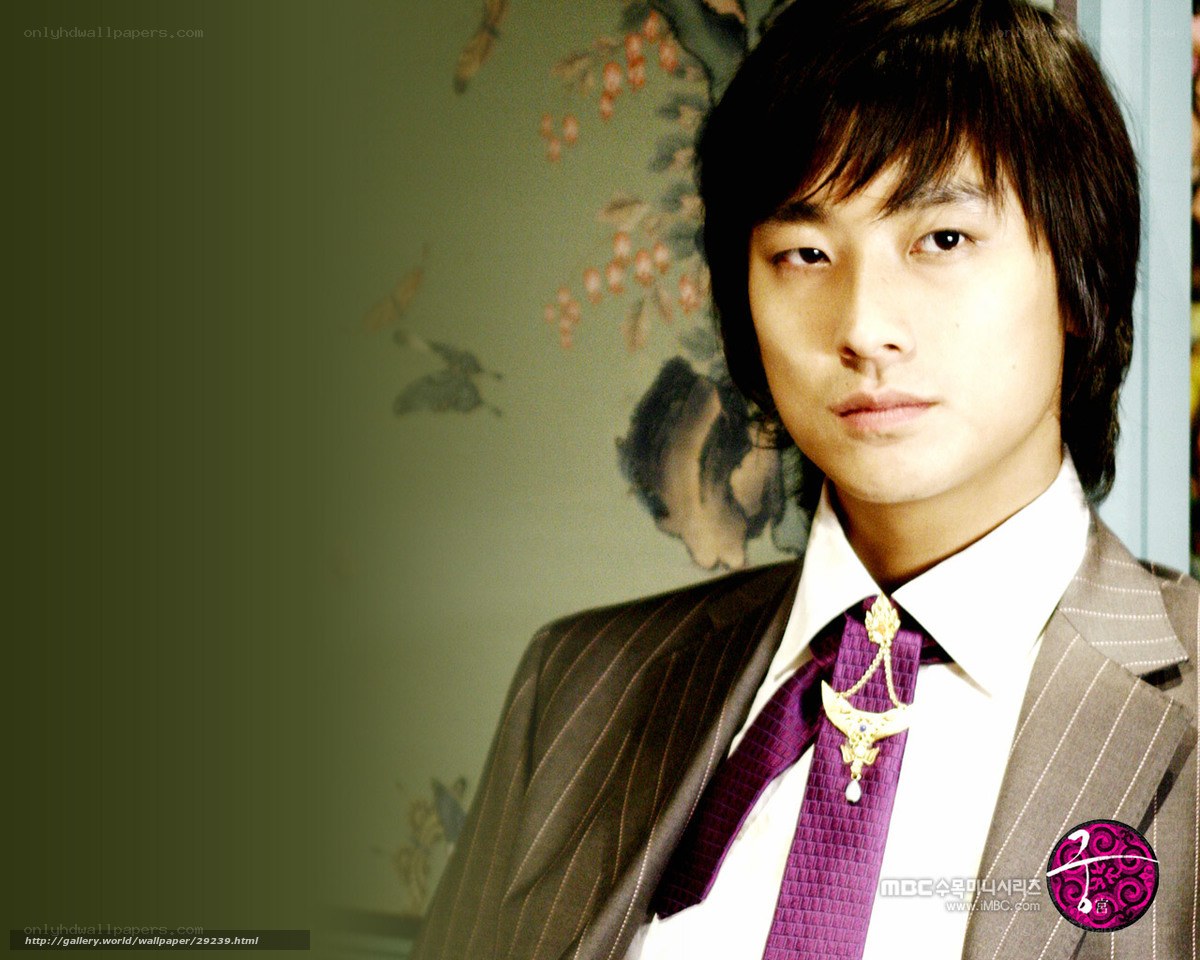 man in suit with purple tie