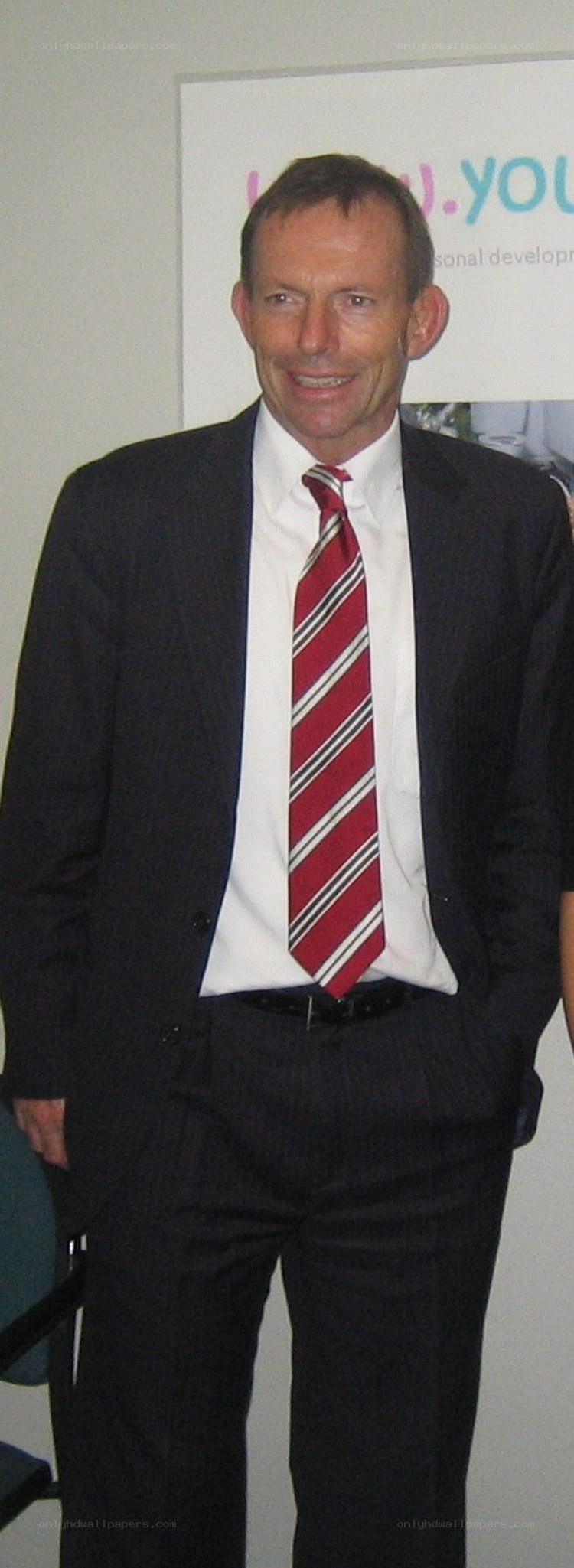 Man in suit with red tie