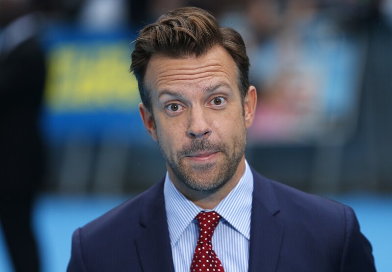 man in suit with surprised expression
