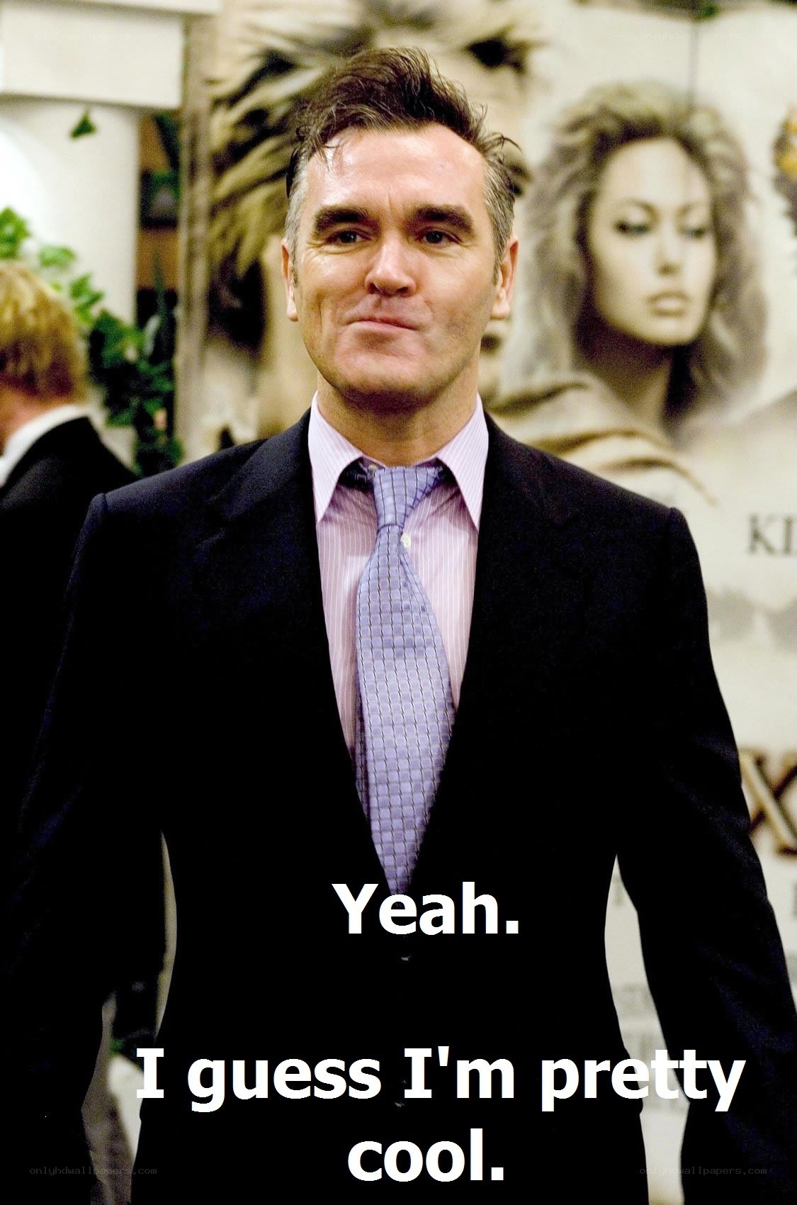 Man in suit with text