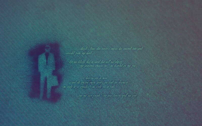 man in suit with text