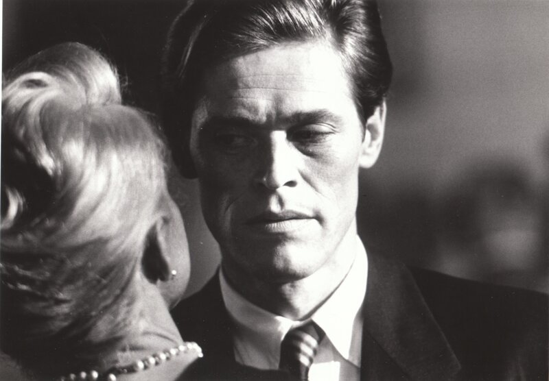 man in suit with woman