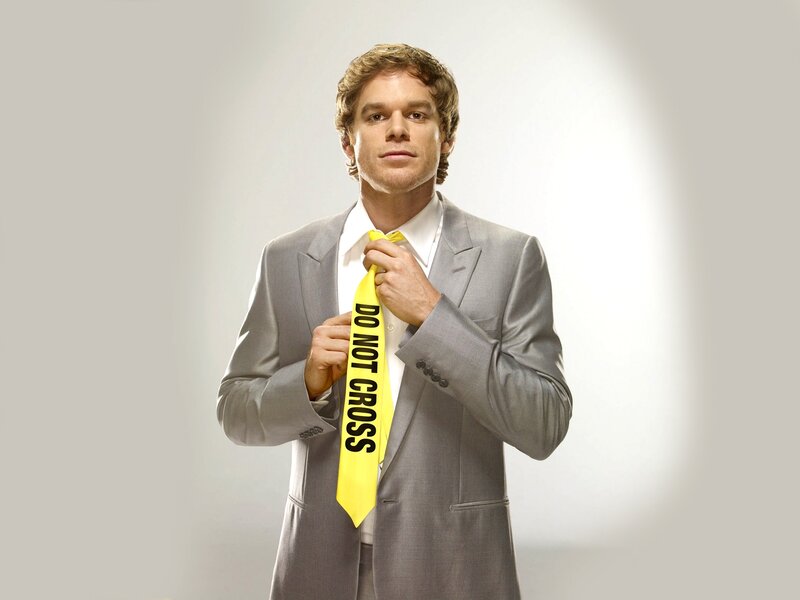 Man in suit with yellow tie