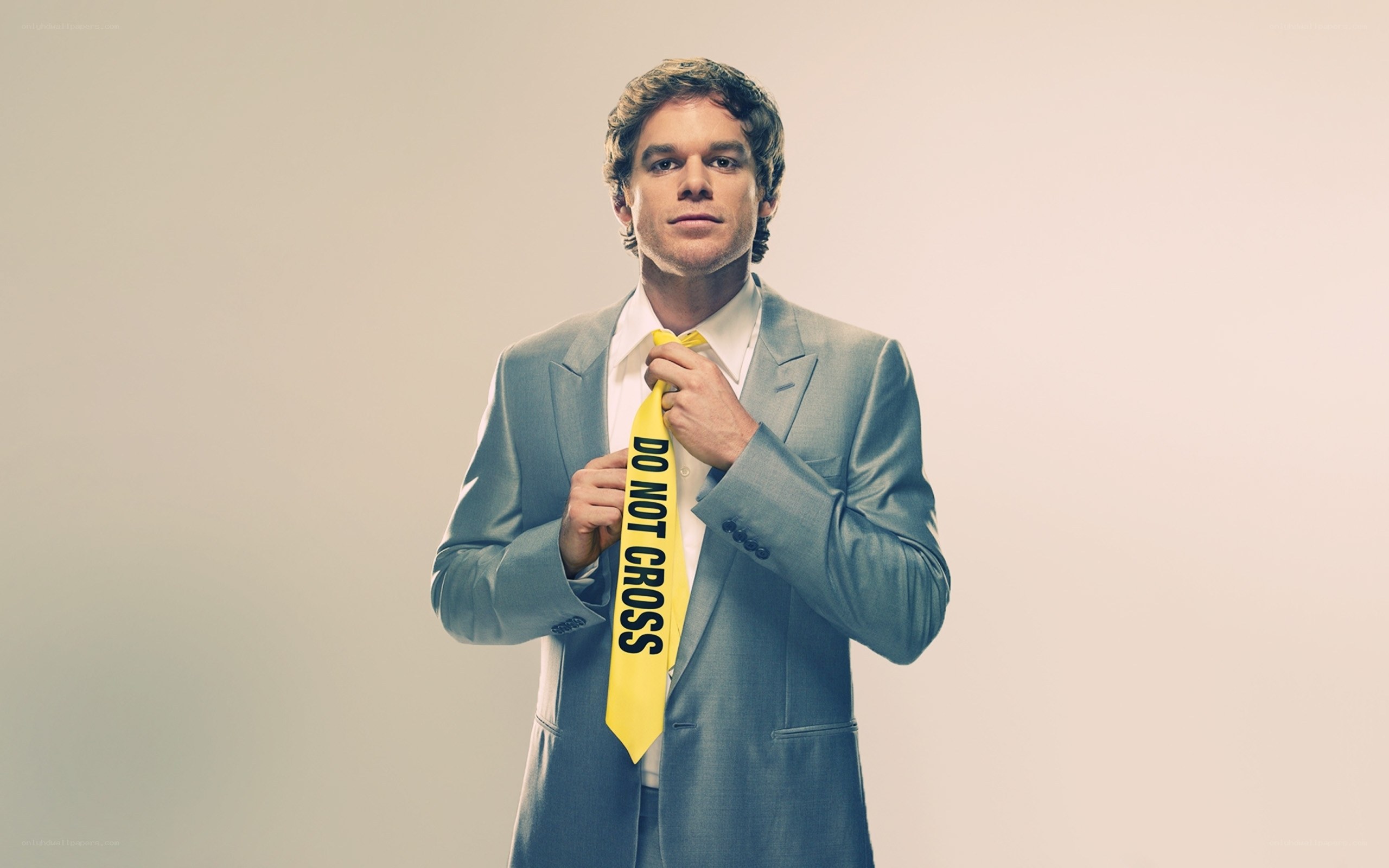 Man in suit with yellow tie