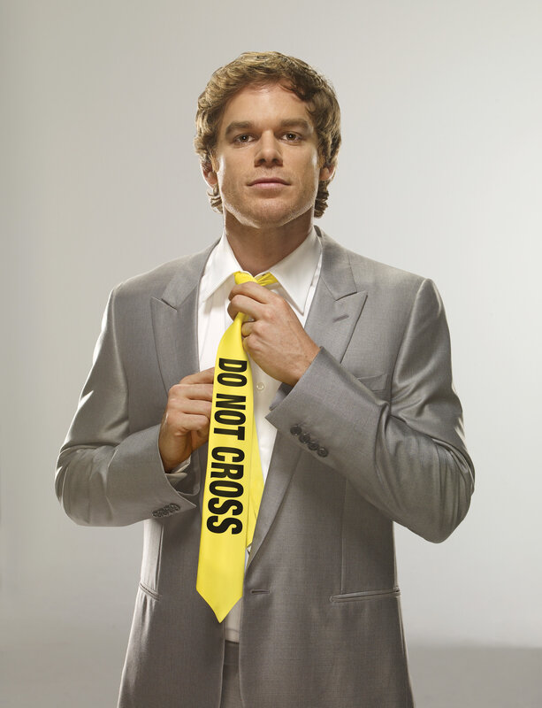 Man in suit with yellow tie