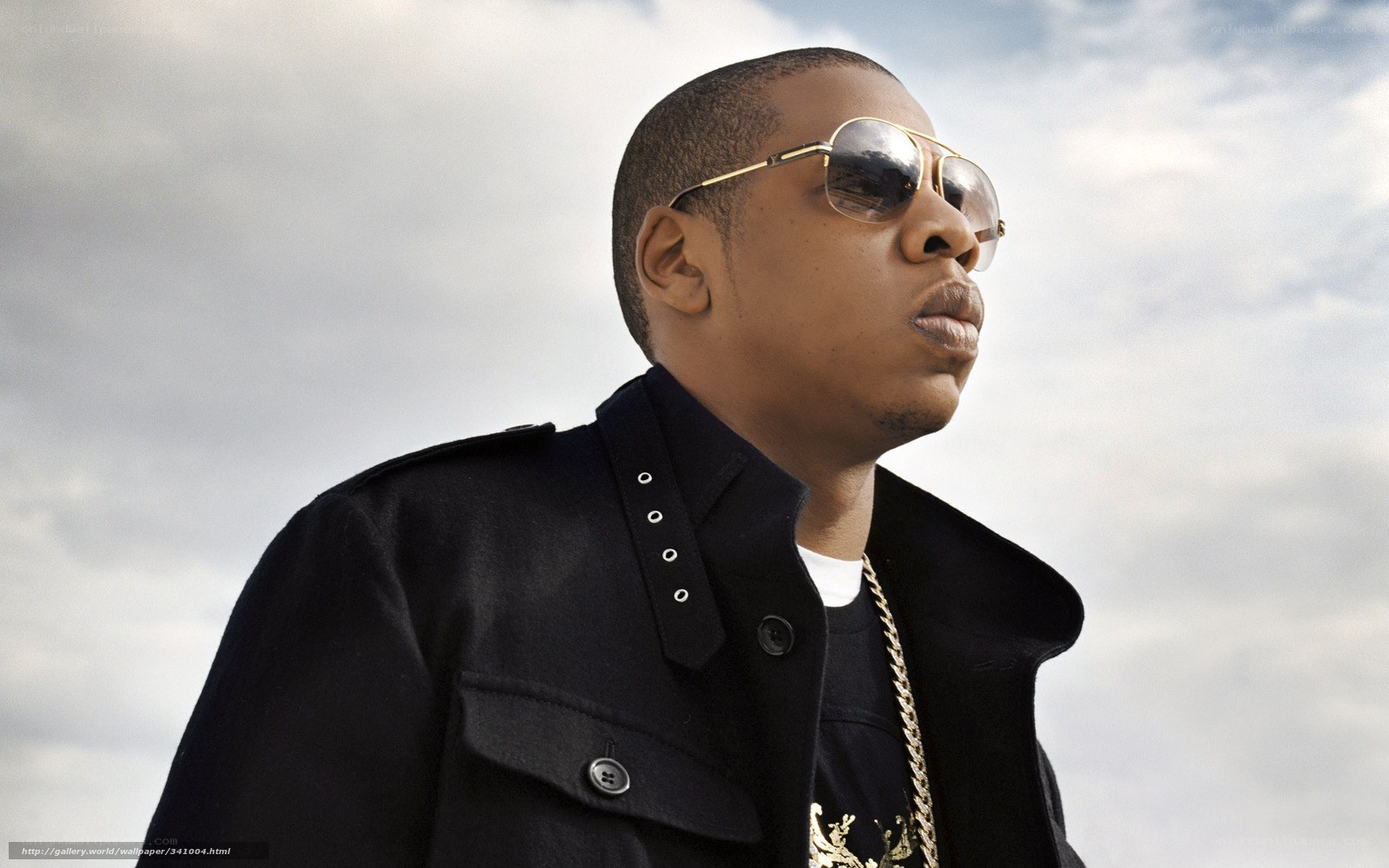 man in sunglasses and black coat
