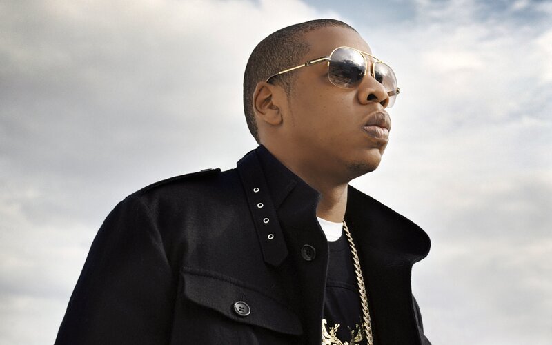 man in sunglasses and black coat