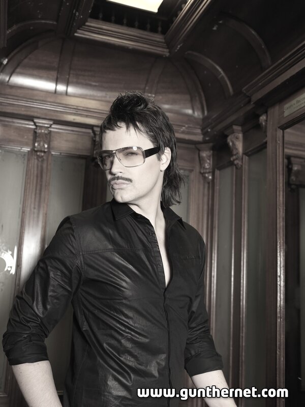 man in sunglasses and black shirt