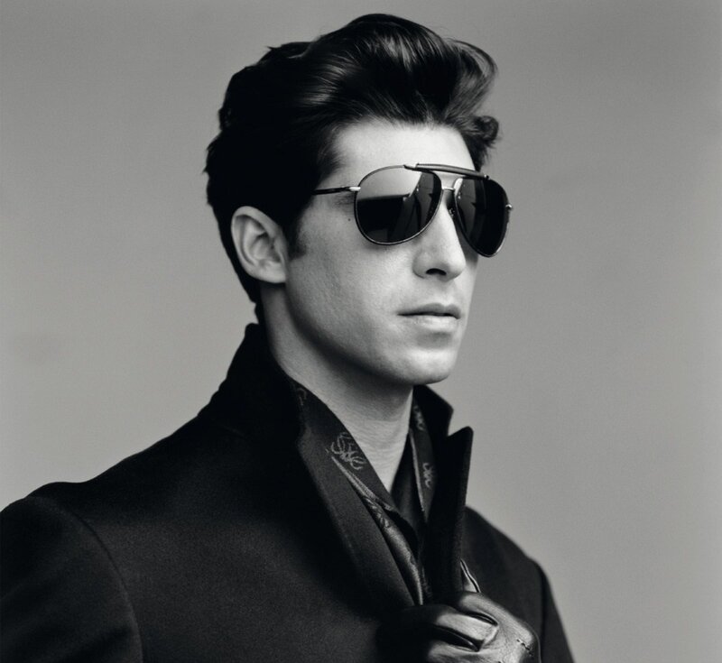man in sunglasses and coat