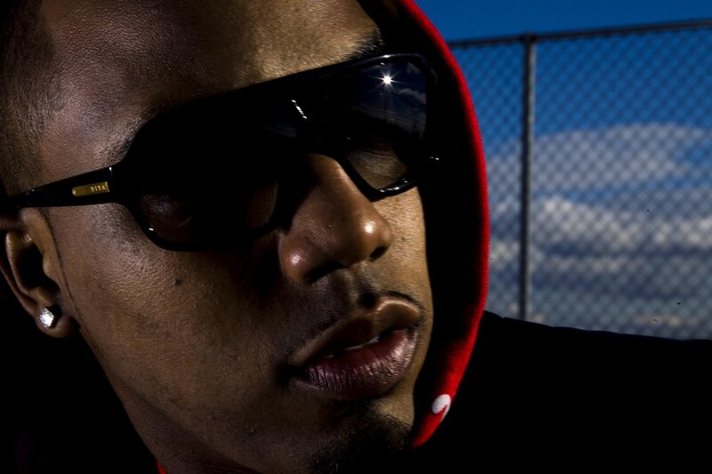 man in sunglasses and hoodie