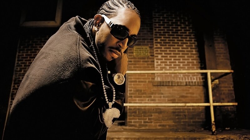 man in sunglasses and hoodie