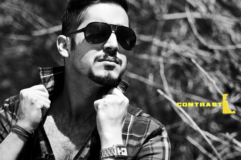 Man in sunglasses and plaid shirt