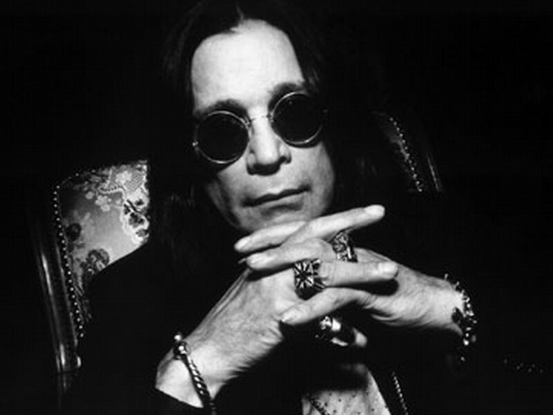 man in sunglasses and rings