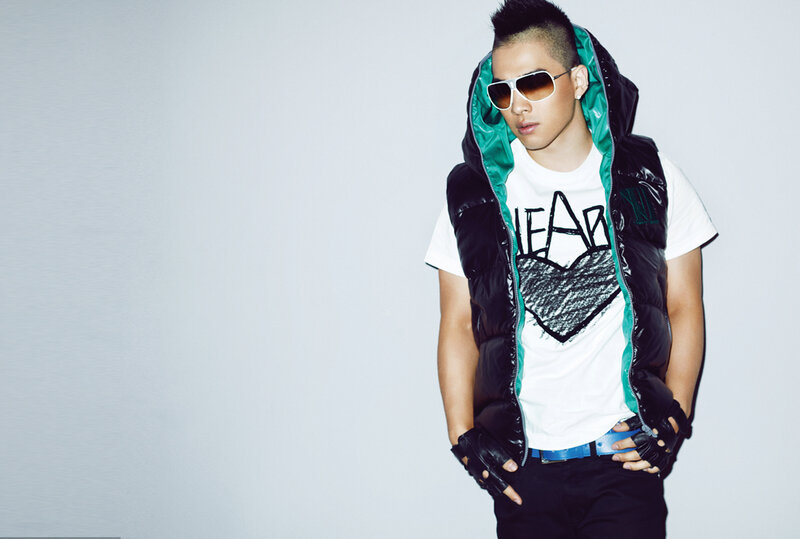 man in sunglasses and vest