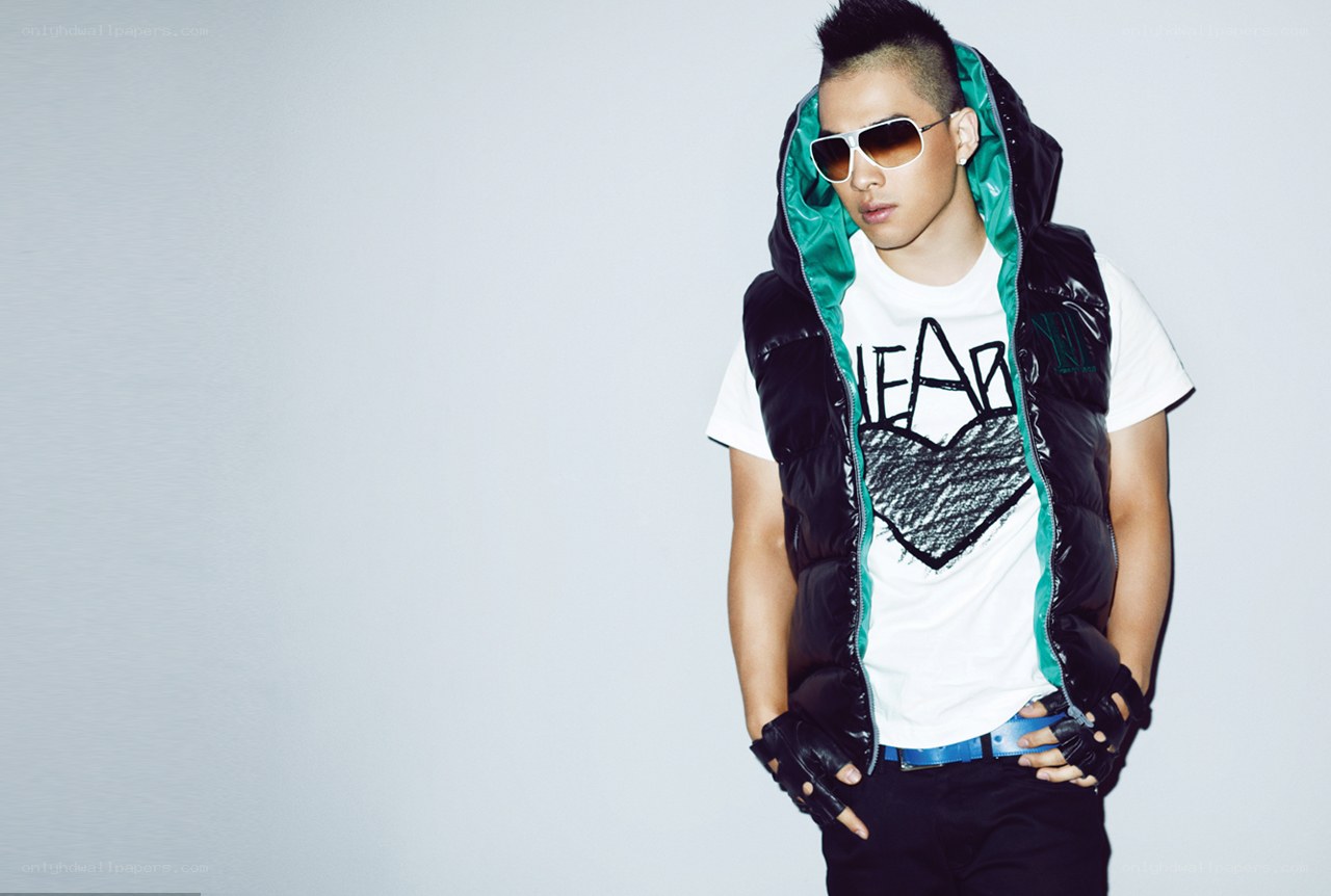 man in sunglasses and vest